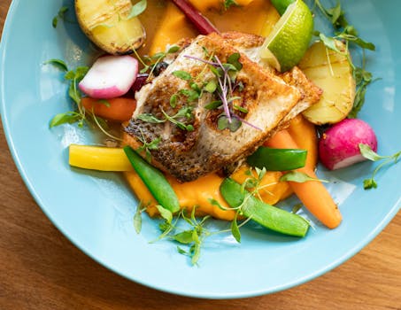 healthy plate of grilled salmon and vegetables